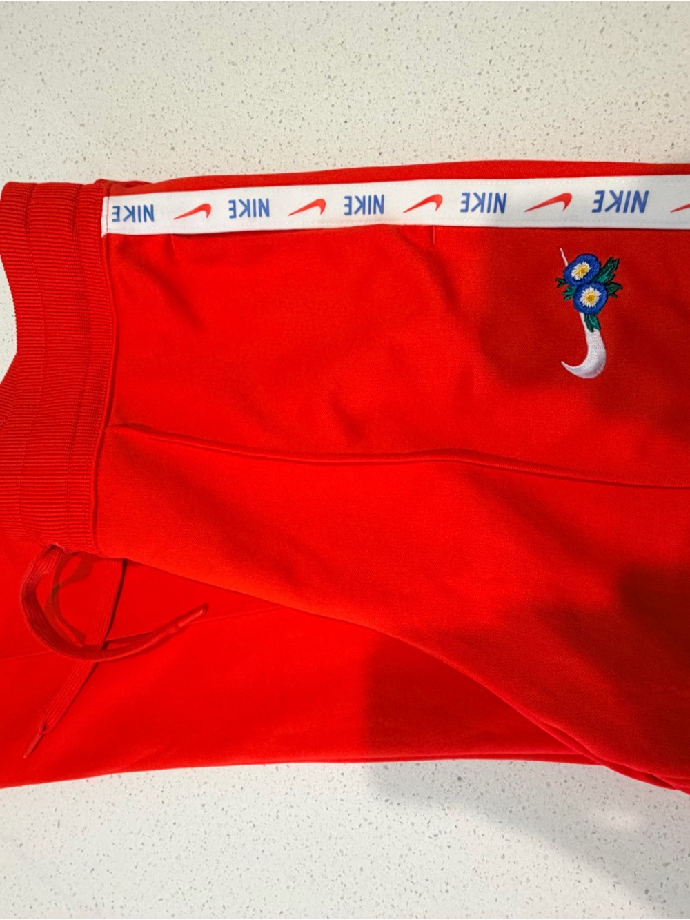 Nike Red Joggers with Logo Tape - Picture 2 of 3